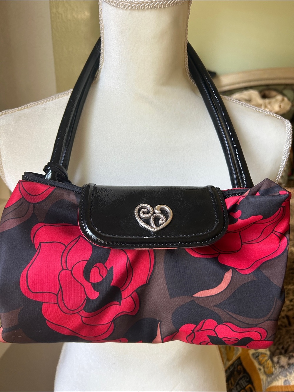 Brighton Black Handle Floral Shoulder Bag in Red and Black transforms to tote